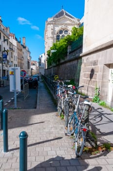 NANTES, FRANCE - SEPTEMBER 12, 2017: cityscape, cobblestone streets among old houses in downtown Nantes, France