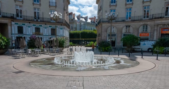 NANTES, FRANCE - SEPTEMBER 12, 2017: Nantes - Place Graslin, fountain in the center of the square, France