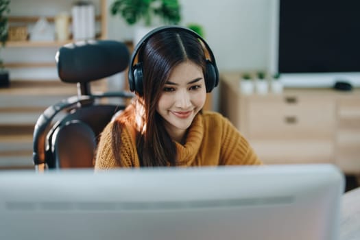 Beautiful young teen asian business woman meeting at on computer laptop with planning working on financial document, tax, exchange, accounting and Financial advisor.