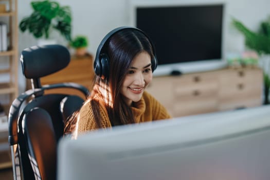 Beautiful young teen asian business woman meeting at on computer laptop with planning working on financial document, tax, exchange, accounting and Financial advisor.