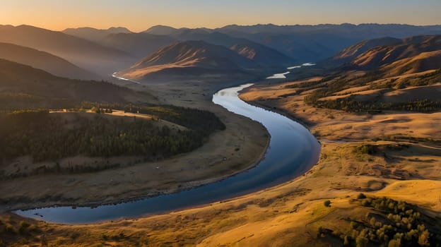 The golden hues of sunset illuminate a winding river as it flows gracefully through a vast valley surrounded by majestic mountains. Lush greenery contrasts beautifully with the golden grasslands, creating a serene and picturesque landscape that invites tranquility.