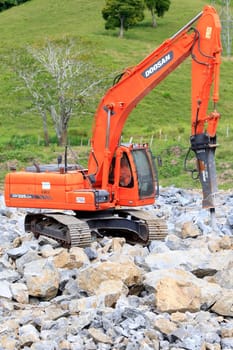 ilheus, bahia, brazil - may 23, 2022: stone crushing machine for gravel production at a construction site in the city of Ilheus.