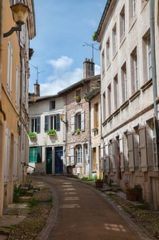 street with old houses in the french city of tournus