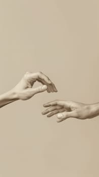 Hands reaching out on beige background, connection concept.