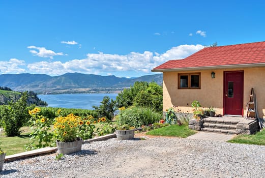 A perfect neighborhood. Residential house with beautiful overview of the lake and mountains in Okanagan valley.