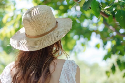 A woman enjoys the warm weather, dressed in a breezy summer outfit, while relaxing under the shade of lush green trees.