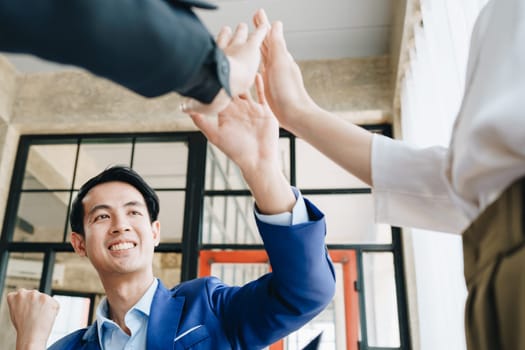 Business Success concept with partner, Partnership Giving Fist Bump after Complete a deal. Successful Teamwork, Businessman with Team Agreement in Corporate