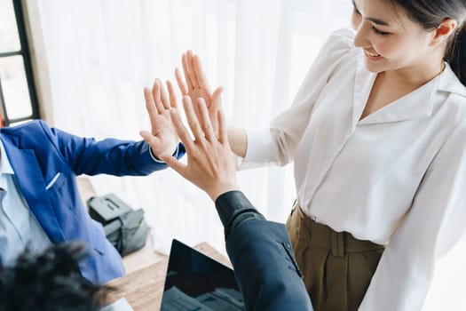 Business Success concept with partner, Partnership Giving Fist Bump after Complete a deal. Successful Teamwork, Businessman with Team Agreement in Corporate