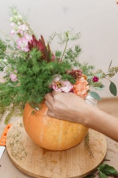 Creating a floral composition in a pumpkin. Making decor with your own hands