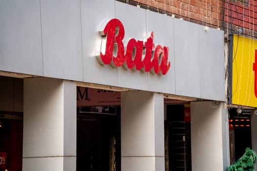Delhi, India - 30th Dec 2022: Storefront with Bata branding showing the popular shoe, foot wear, fashion store offering affordable products