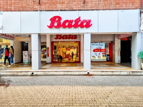 Delhi, India - 30th Dec 2022: Storefront with Bata branding showing the popular shoe, foot wear, fashion store offering affordable products