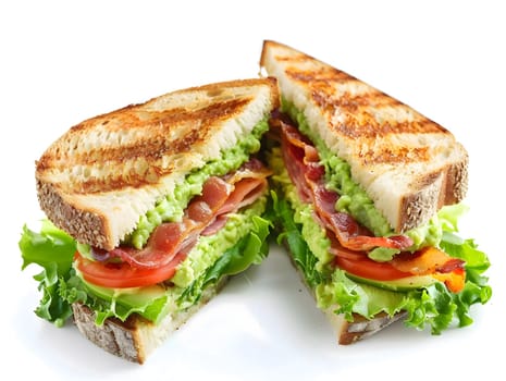 A mouthwatering sandwich filled with creamy avocado, crispy bacon, and fresh tomato, all nestled between perfectly toasted bread.
