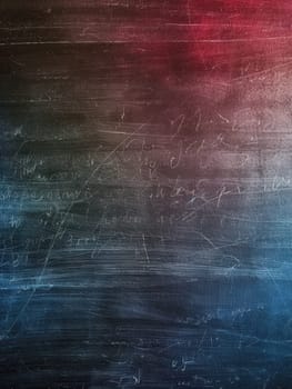 A classroom chalkboard displays vibrant spirals and abstract shapes, showcasing creativity and energetic learning in progress.