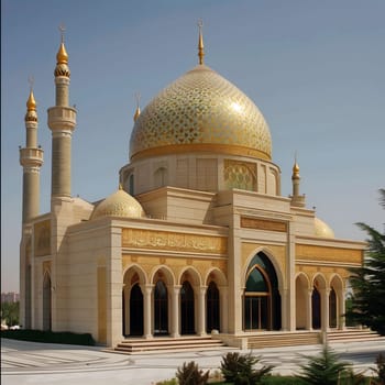 A large mosque with golden domes and minarets stands tall against a clear blue sky.