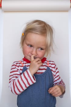 Beautiful happy caucasian toddler child girl smiling, portrait neutral background High quality photo