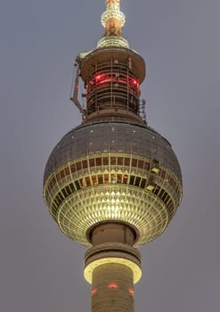 Berlin, Germany - Dec 18, 2023 - Famous Berlin Television Tower (Fernsehturm) with night sky background near Alexanderplatz in Berlin, A Tourist attraction and Meeting place, Copy space, Sective focus.