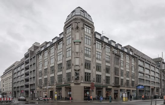 Berlin, Germany - Dec 19, 2023 - Architecture exterior of Friedrichstrasse 61 or Geschaeftsgebaeude corner (Art-deco building) in Berlin-Mitte, Space for text, Selective focus.