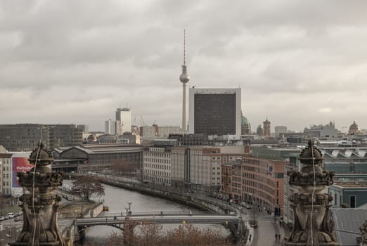 Berlin, Germany - Dec 20, 2023 - Berlin cityscape view from above of Reichstag building with Berlin Television Tower, Berliner Dom, Marschall Bridge, River Spree and buildings at the downtown Berlin. a major tourist attraction of the berlin city, Space for text, Selective focus.