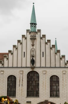 Munich, Germany - Dec 21, 2023 - Exterior architecture of Old Town Hall building (Altes Rathaus) now Toy Museum munich or Spielzeugmuseum at Marienplatz square in Munich. Late-gothic style, Copy space, Selective focus.