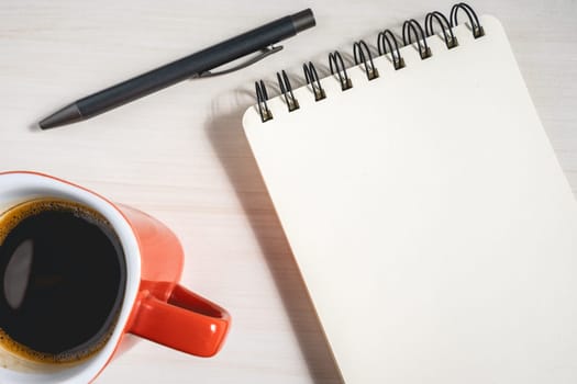 A pen A notebook and a cup of coffee. Background for ideas or inspiration.