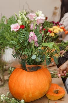 Creating a floral composition in a pumpkin. Making decor with your own hands