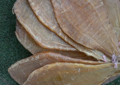 Detail of Fish Maw Soup or Dried Fish Stomach (Dried Fish Bladder). Chinese dried food, Healthy eating lifestyle concept, Top vew,  Copy space, Selective focus.