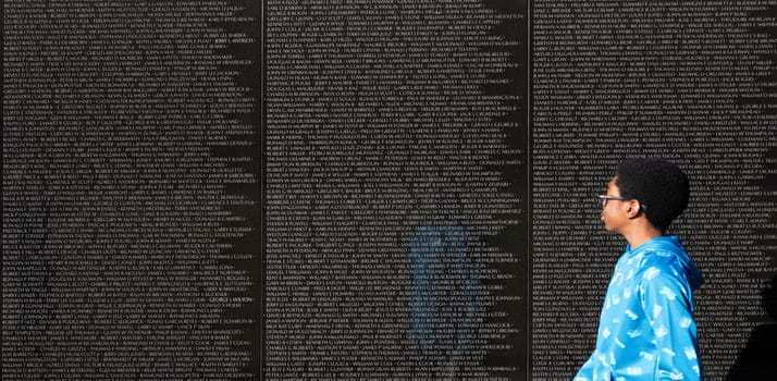 Washington DC, USA - Oct. 10, 2022: People at the Vietnam War Memorial in Washington DC
