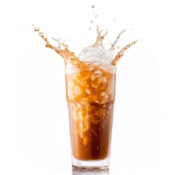 Thai iced tea with tea milk and ice cubes whirling in a glass with liquid. Food isolated on transparent background.