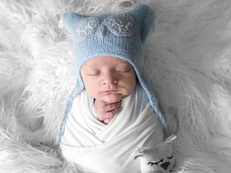 Newborn Baby Sleeps During Photoshoot In Owl Hat