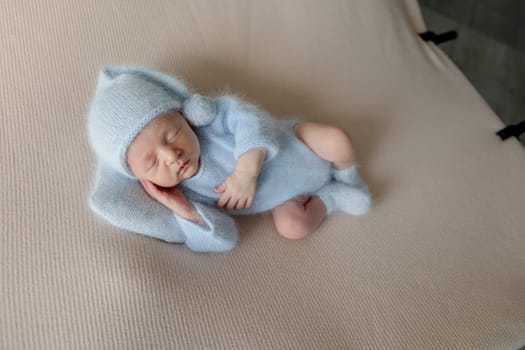 Newborn Baby Sleeps During Photo Session In Blue Gnome Costume