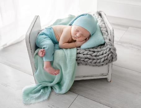 Newborn Baby Sleeps During Photo Session