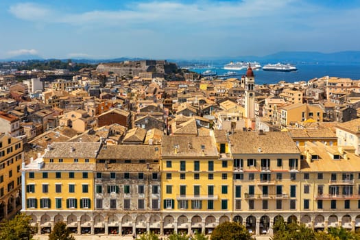 Panoramic view of Kerkyra, capital of Corfu island, Greece. Aerial drone view of Kerkyra with beautiful buildings during summer sunny day. Corfu island, Greece. 