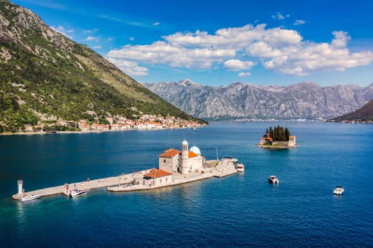 Saint George Island and Church of Our Lady of the Rocks in Perast, Montenegro. Our Lady of the Rock island and Church in Perast on shore of Boka Kotor bay (Boka Kotorska), Montenegro, Europe. 