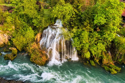 Village of Rastoke near Slunj in Croatia, old water mills on waterfalls of Korana river, beautiful countryside landscape. Landscape with river and little waterfalls in Rastoke village, Croatia.