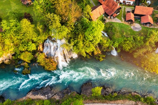 Village of Rastoke near Slunj in Croatia, old water mills on waterfalls of Korana river, beautiful countryside landscape. Landscape with river and little waterfalls in Rastoke village, Croatia.