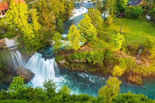 Village of Rastoke near Slunj in Croatia, old water mills on waterfalls of Korana river, beautiful countryside landscape. Landscape with river and little waterfalls in Rastoke village, Croatia.