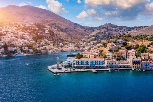 Aerial view of the beautiful greek island of Symi (Simi) with colourful houses and small boats. Greece, Symi island, view of the town of Symi (near Rhodes), Dodecanese.