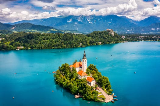 Lake Bled in Slovenia. Beautiful mountains and Bled lake with small Pilgrimage Church. Bled lake and island with Pilgrimage Church of the Assumption of Maria. Bled, Slovenia, Europe.