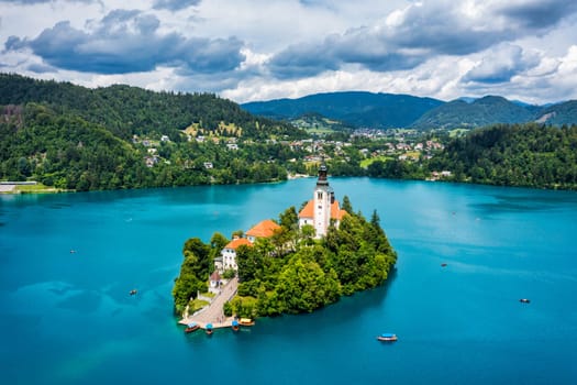Lake Bled in Slovenia. Beautiful mountains and Bled lake with small Pilgrimage Church. Bled lake and island with Pilgrimage Church of the Assumption of Maria. Bled, Slovenia, Europe.