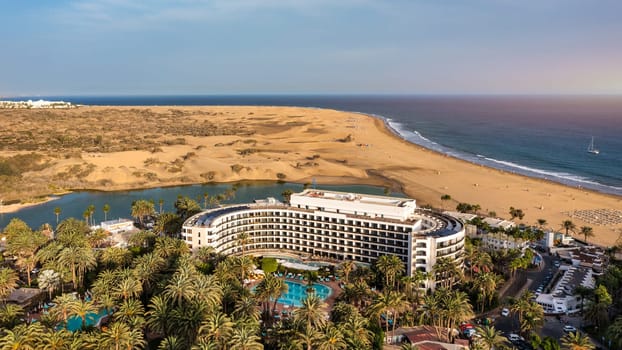 Landscape with Maspalomas town and golden sand dunes, Gran Canaria, Canary Islands, Spain. Natural Reserve of Dunes of Maspalomas, in Gran Canaria, Canary Islands, Spain.