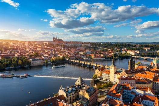 Prague scenic spring aerial view of the Prague Old Town pier architecture Charles Bridge over Vltava river in Prague, Czechia. Old Town of Prague with the Castle in the background, Czech Republic.
