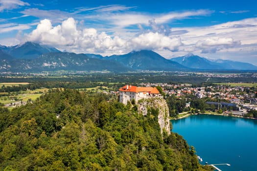 Bled, Slovenia, aerial view of beautiful Bled Castle (Blejski Grad) with Lake Bled (Blejsko Jezero), the Church of the Assumption of Maria on a bright summer day. Bled, Slovenia.