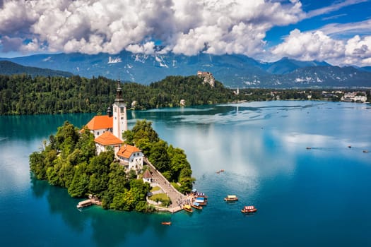 Lake Bled in Slovenia. Beautiful mountains and Bled lake with small Pilgrimage Church. Bled lake and island with Pilgrimage Church of the Assumption of Maria. Bled, Slovenia, Europe.