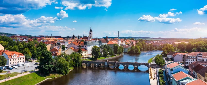 Medieval Town Pisek and historic stone bridge over river Otava in the Southern Bohemia, Czech Republic. Pisek Stone Bridge, the oldest preserved early Gothic bridge in the Czech republic.