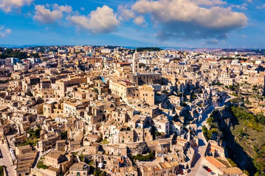 Panoramic view of the ancient town of Matera (Sassi di Matera) in a beautiful autumn day, Basilicata, southern Italy. Stunning view of the village of Matera. Matera is a city on a rocky outcrop.