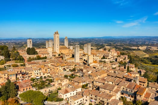 Town of San Gimignano, Tuscany, Italy with its famous medieval towers. Aerial view of the medieval village of San Gimignano, a Unesco World Heritage Site. Italy, Tuscany, Val d'Elsa.
