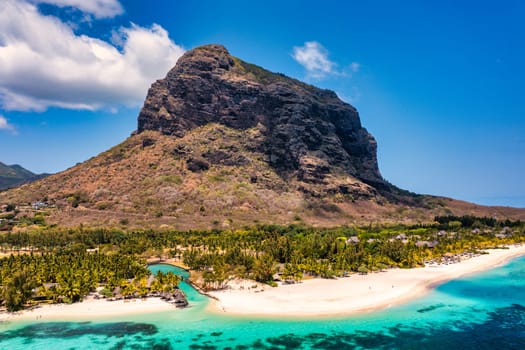 Tropical scenery, beautiful beaches of Mauritius island, Le Morne, popular luxury resort. Le Morne beach luxury resorts, Mauritius. Luxury beach in Mauritius, sandy beach with palms and blue ocean. 