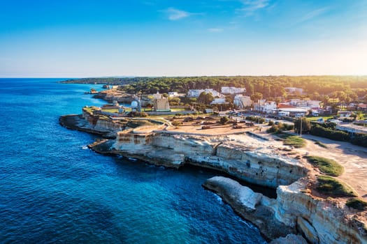 Stunning seascape with cliffs rocky arch and stacks (Faraglioni) at Torre Sant Andrea, Salento coast, Puglia region, Italy. Beautiful cliffs and sea stacks of Sant'Andrea, Salento, Apulia, Italy