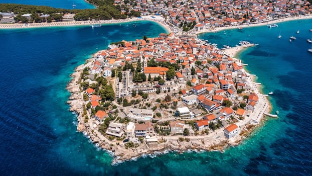 Aerial view of Primosten old town on the islet, Dalmatia, Croatia. Primosten, Sibenik Knin County, Croatia. Resort town on the Adriatic coast. Aerial view of adriatic town Primosten, Croatia