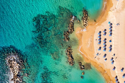 Aerial panoramic view of Coral bay beach, Cyprus. Overhead view of Coral Bay beach, Peyia village, Paphos district, Cyprus. Aerial view of Coral Bay beach in Peyia village, Cyprus.